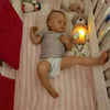Nutria Relajante Peluche Sonido Y Luces Para Bebe Importada